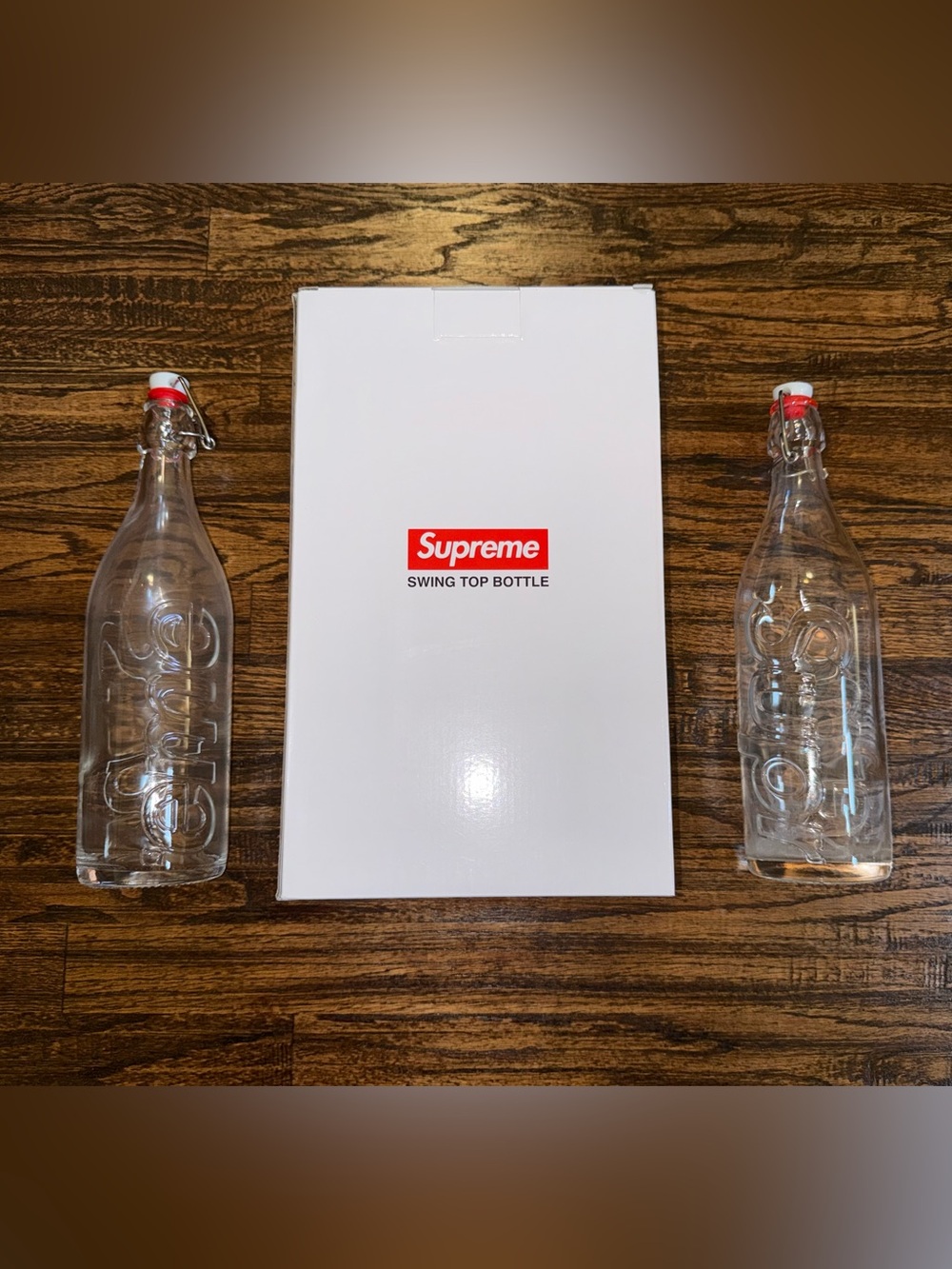 SUPREME Logo Swing Top 1.0L Clear Glass Bottles - Set Of 2 - FW21 Collection